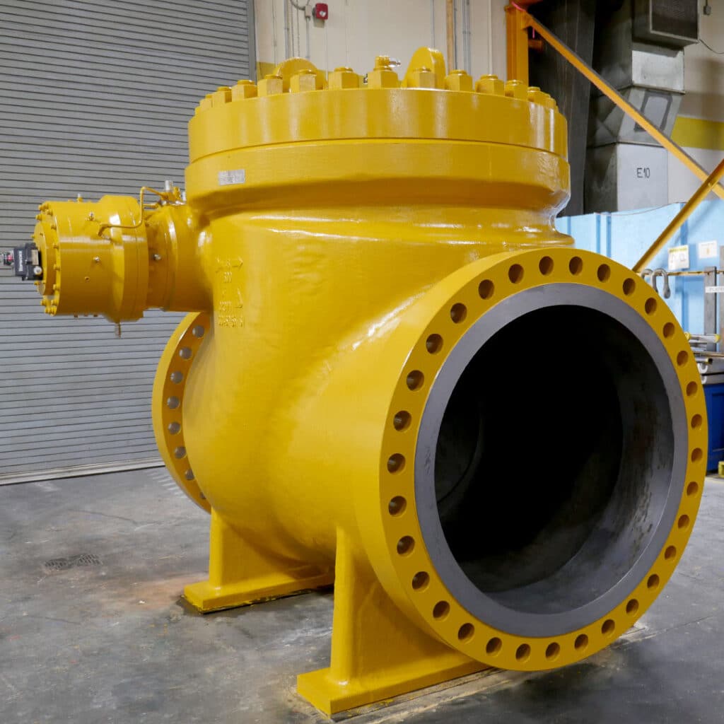 Crown™ Swing check valve with non-slam dampening painted in Stream-Flo yellow.