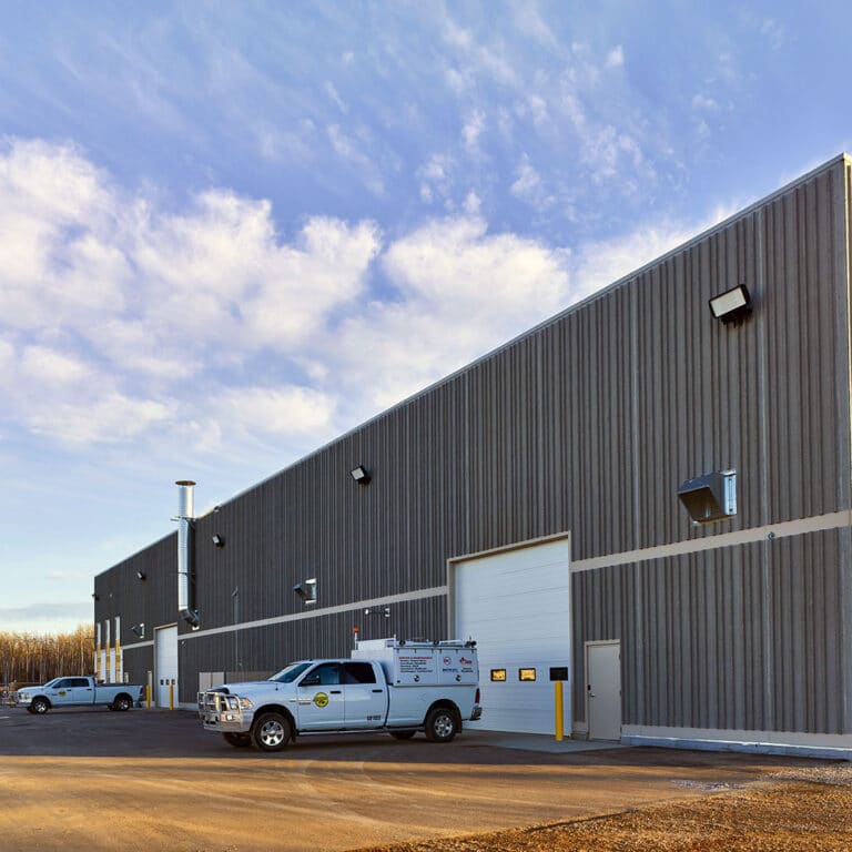 Stream-Flo Canada location in Ft. McMurray, Alberta. Photo of the building sign and bay doors.